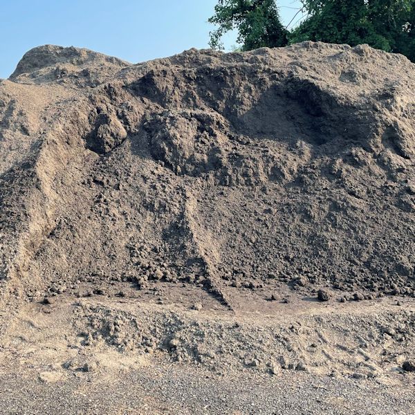 Large pile of dirt at a construction site