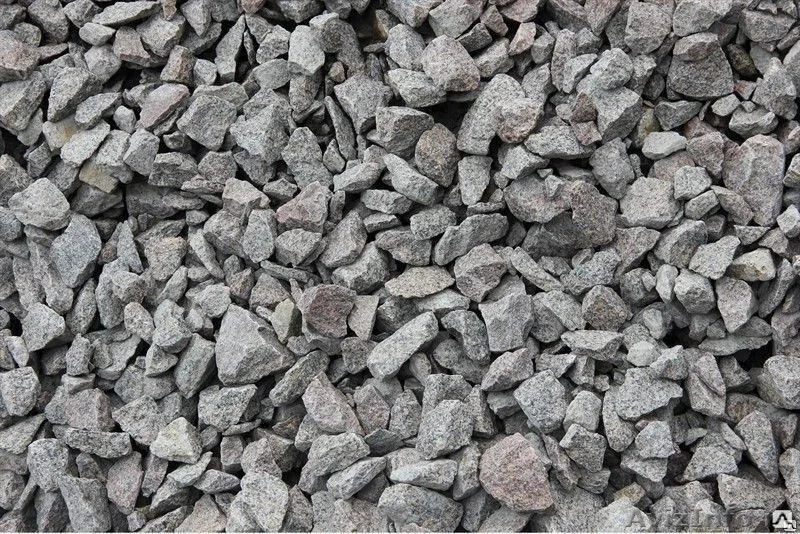 A close-up of #2 crushed stone, a type of drainage gravel aggregate supplied by Indiana Topsoil.